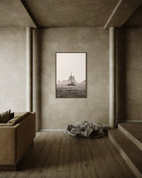 A boat drifting near Es Vedrà, Ibiza, in soft sea haze — fine-art photograph by Kayleigh Groenendijk