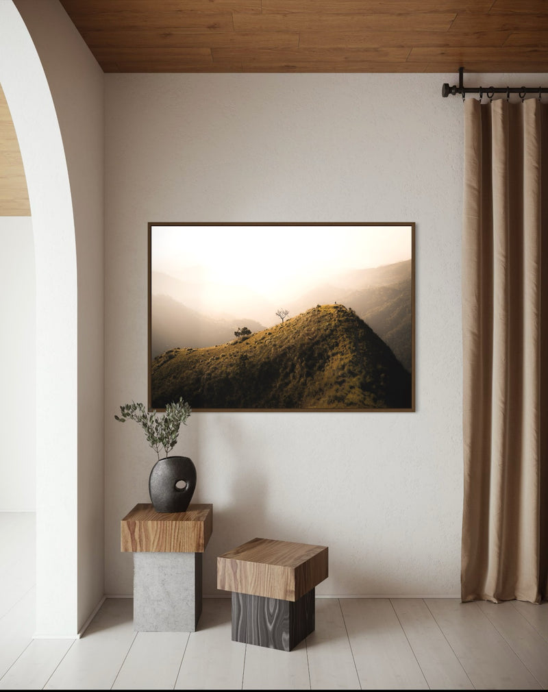 A lone hiker on a misty mountain ridge — fine-art photograph by Kayleigh Groenendijk